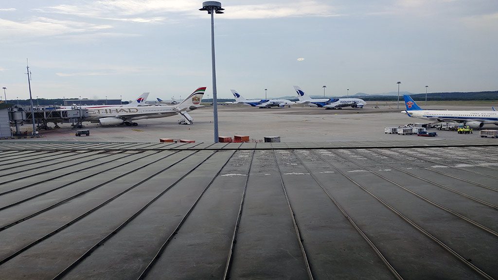 View of aeroplanes from the lounge in KL (Emirates)